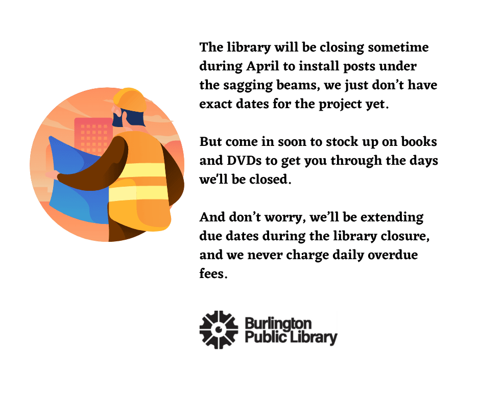 Construction worker looking at blueprints