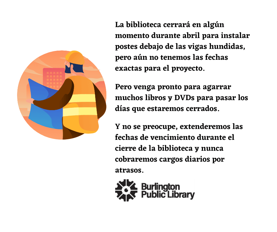 Construction worker looking at blueprints 