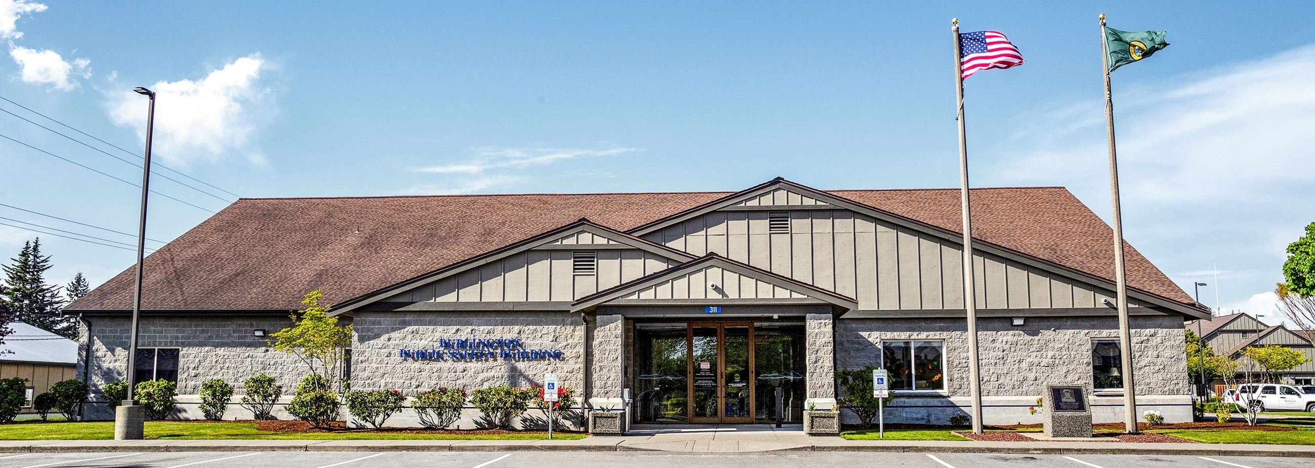 Police and Municipal Court building with flags